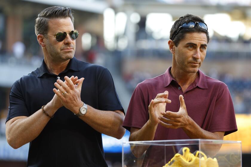 San Diego, CA - July 3: San Diego Padres' CEO Erik Greupner and A.J. Preller President of baseball operations and General Manager look on before a game against the Los Angeles Angels at Petco Park on Monday, July 3, 2023. (K.C. Alfred / The San Diego Union-Tribune)