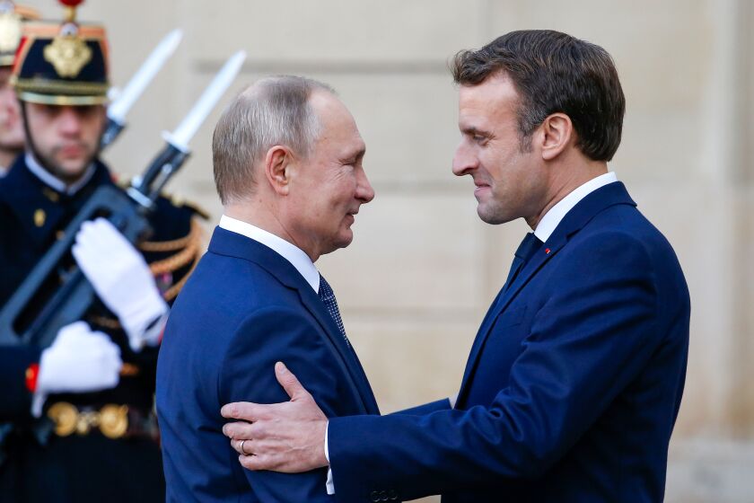 French President Emmanuel Macron welcomes Russian President, Vladimir Putin.
