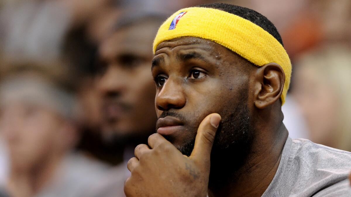 Cleveland Cavaliers star LeBron James looks on during a loss to the Utah Jazz on Wednesday.