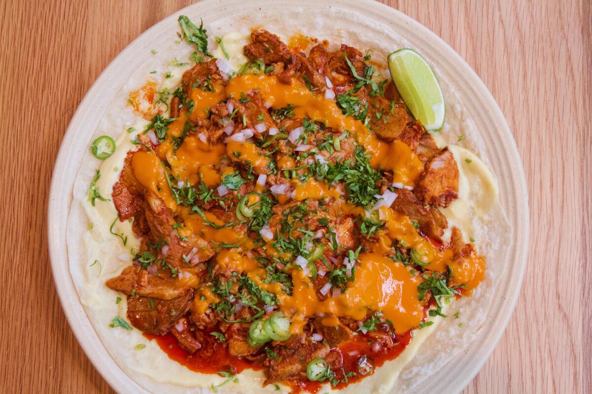 An overhead photo of a plate of al pastor.