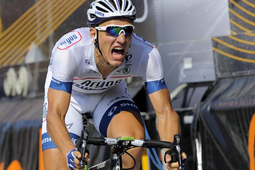 Marcel Kittel reacts as he crosses the finish line to win Stage 10 of the Tour de France on Tuesday.