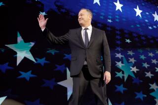 DNC CHICAGO, IL AUGUST 20, 2024 - Second gentleman Doug Emhoff walks on the stage during the Democratic National Convention Tuesday, Aug. 20, 2024, in Chicago. (Robert Gauthier/Los Angeles Times)