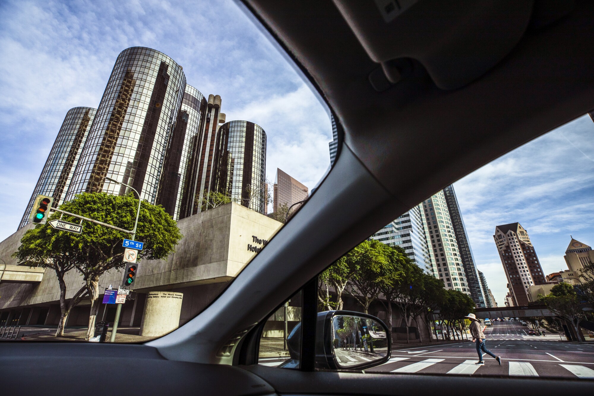 The Westin Bonaventure Hotel & Suites is a cluster of shimmering bronze-windowed towers evoking a rocket ship set to launch.