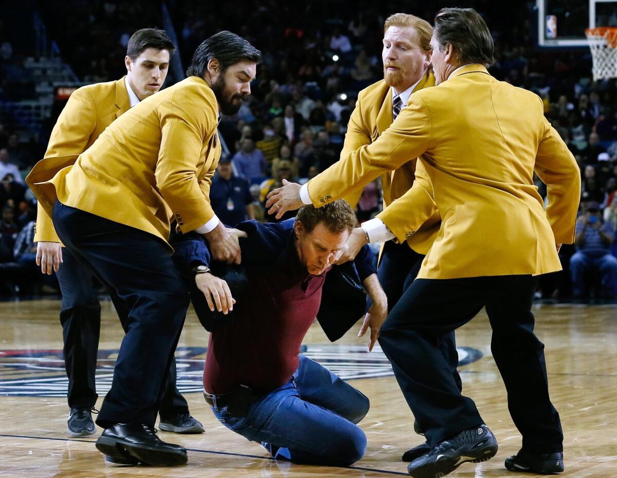 Will Ferrell filming a scene for "Daddy's Home" during halftime of an NBA game.