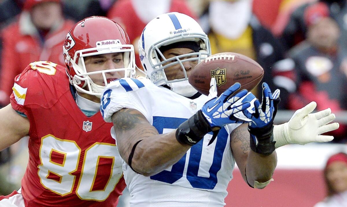 Colts linebacker Jerrell Freeman intercepts a pass in the end zone intended for Chiefs tight end Anthony Fasano (80) in the fourth quarter of their game earlier this month at Arrowhead Stadium in Kansas City