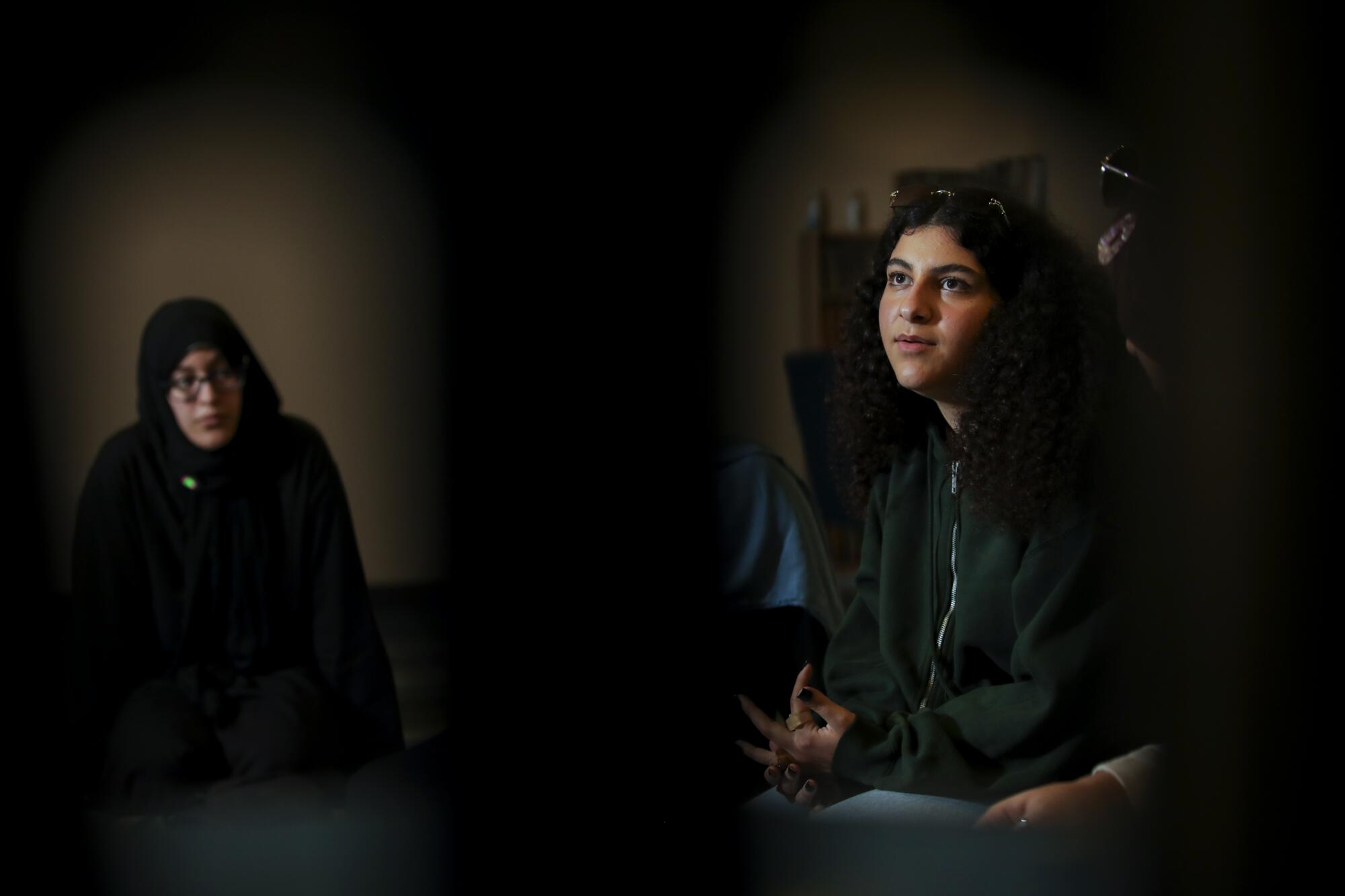Hanae Bentchich, 21, left, and Dalal Oyoun, 17