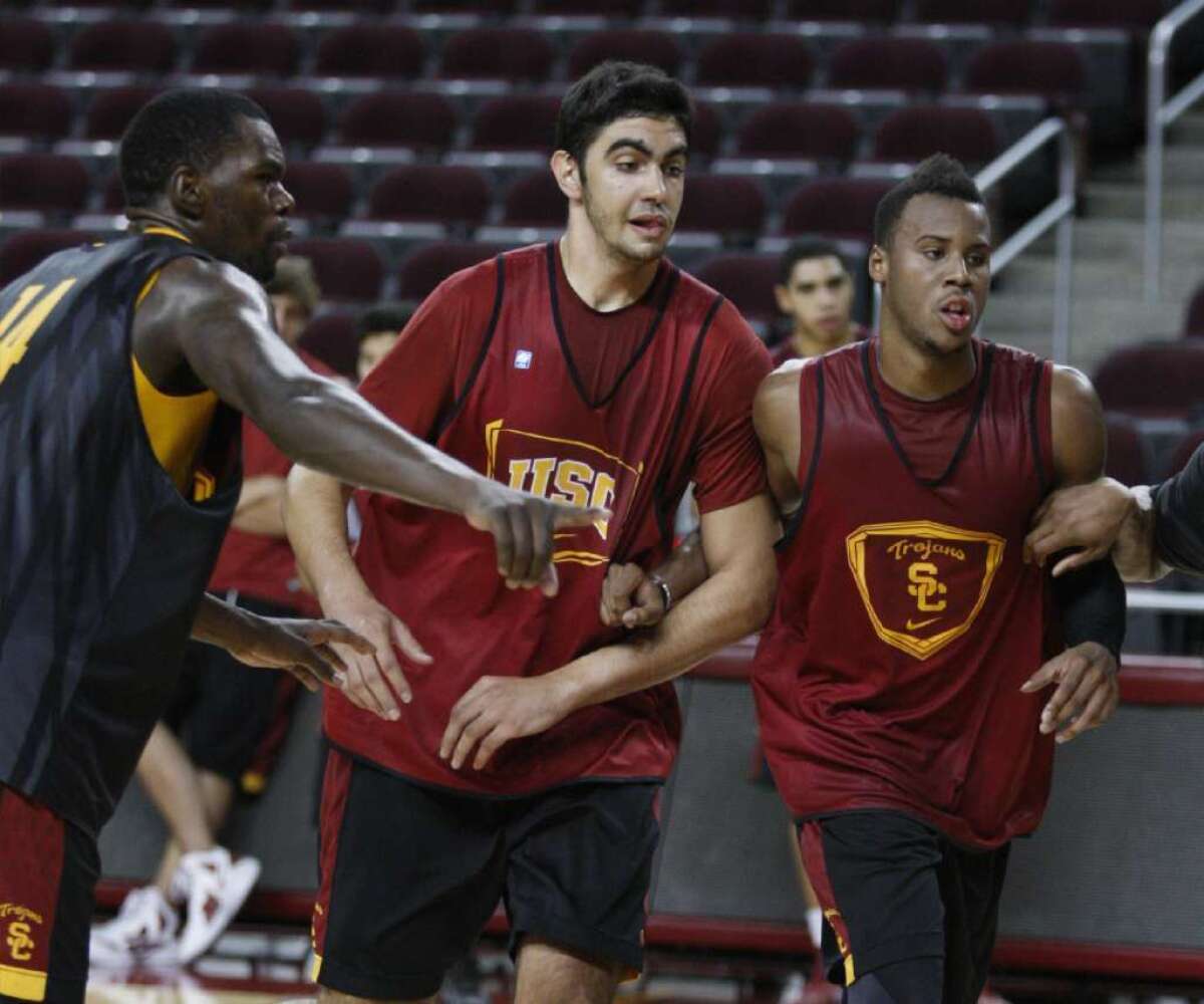 At 7-foot-2, center Omar Oraby, center, is the tallest player on USC's team this season.