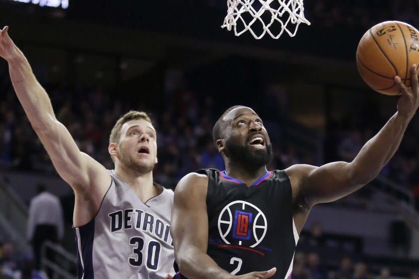 Clippers backup point guard Raymond Felton drives past Pistons forward Jon Leuer for a layup during their game on Nov. 25.