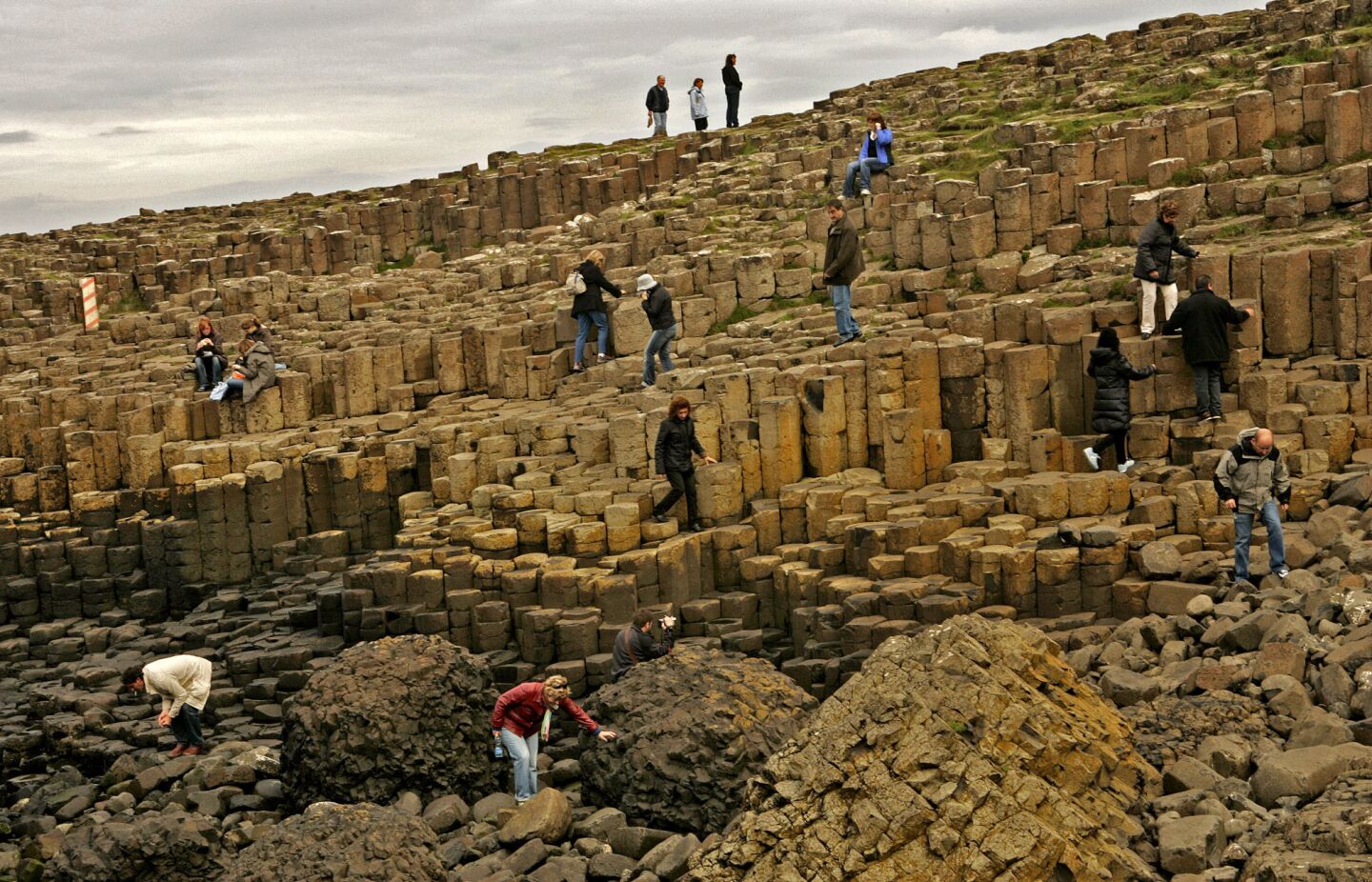 The Giant's Causeway, at the foot of basalt cliffs in Northern Ireland, is made up of 40,000 black basalt columns jutting out of the ocean. Volcanic activity 50 million to 60 million years ago created these step-like columns on the edge of the Antrim plateau.