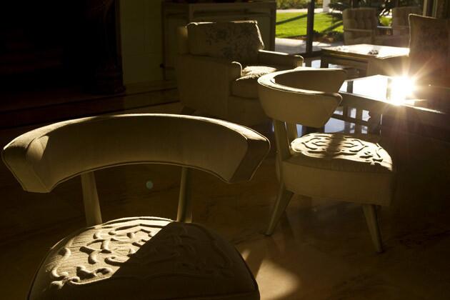 Haines' and Graber's upholstered chairs catch the play of desert light and shadow.