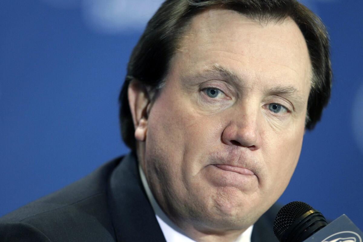 Tom Bradley answers questions during a news conference as Penn State's interim head coach on Nov. 10, 2011.