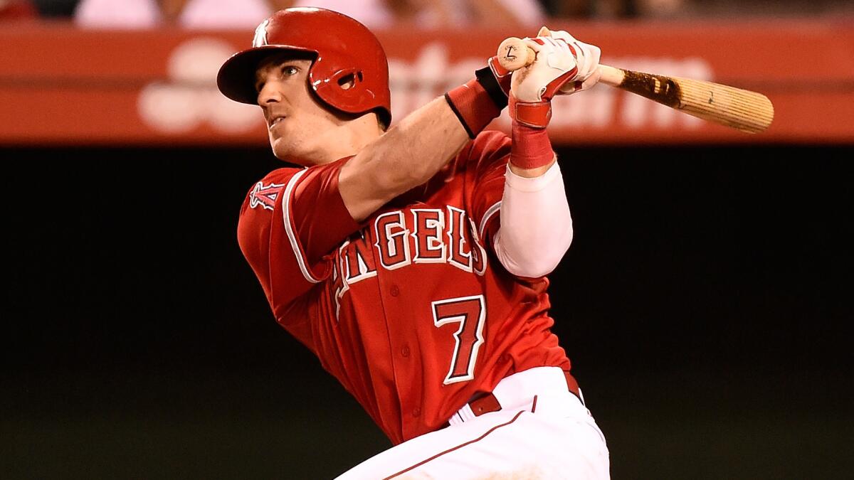 Angels outfielder Collin Cowgill hits a walk-off home run against the Oakland Athletics on June 10. Cowgill was activated from the disabled list Monday.