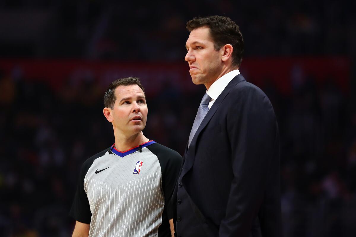 Sacramento coach Luke Walton, shown during a game while with the Lakers, successfully challenged an official's call Saturday during a preseason game.