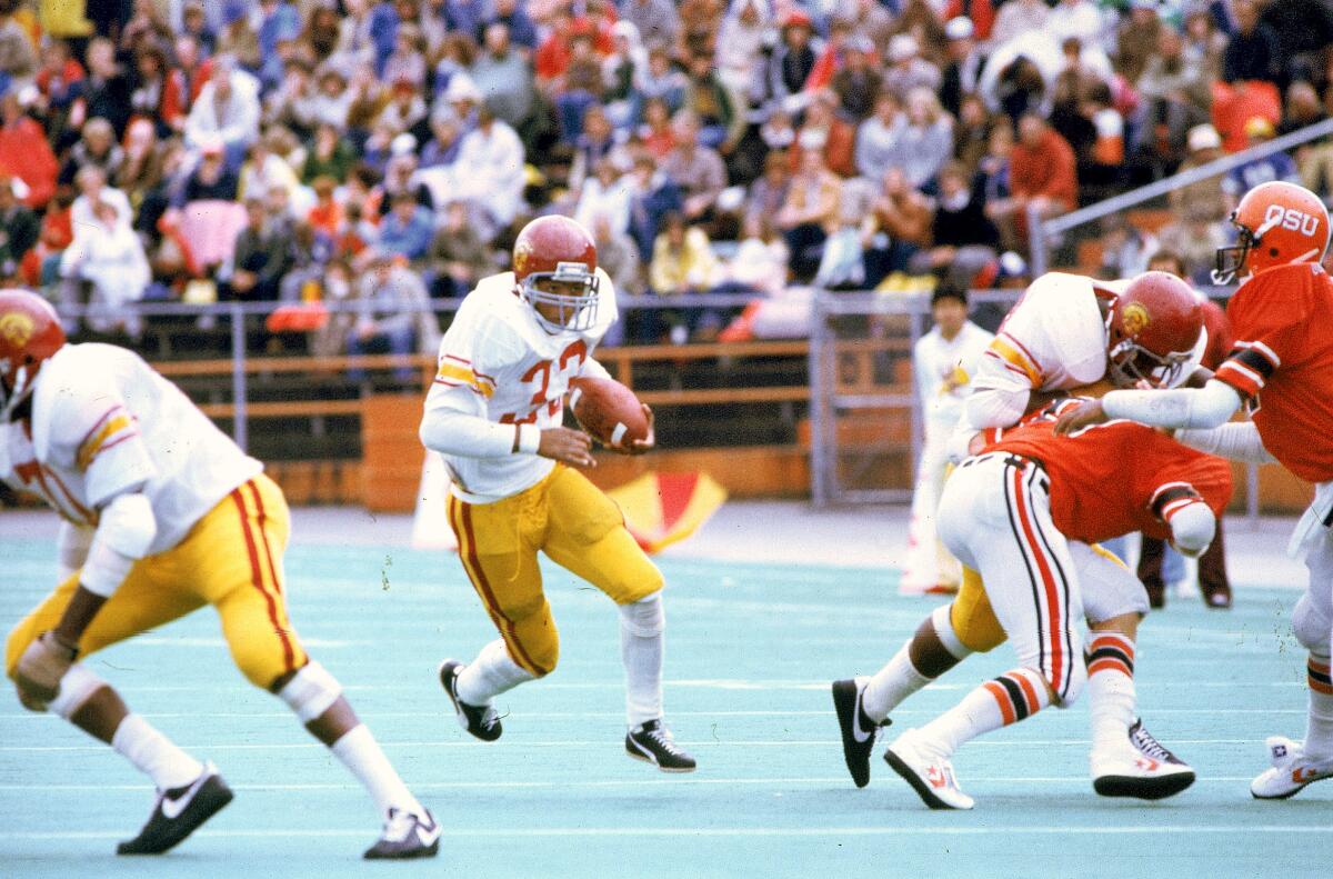 USC football player Marcus Allen (33) is shown carrying the ball against Oregon State in Corvallis, Ore., in 1981. 