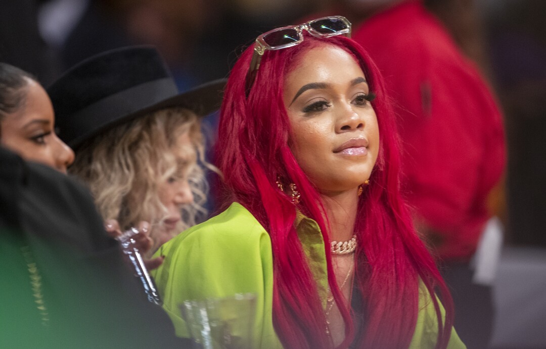 Saweetie watches the Lakers game at Staples Center.