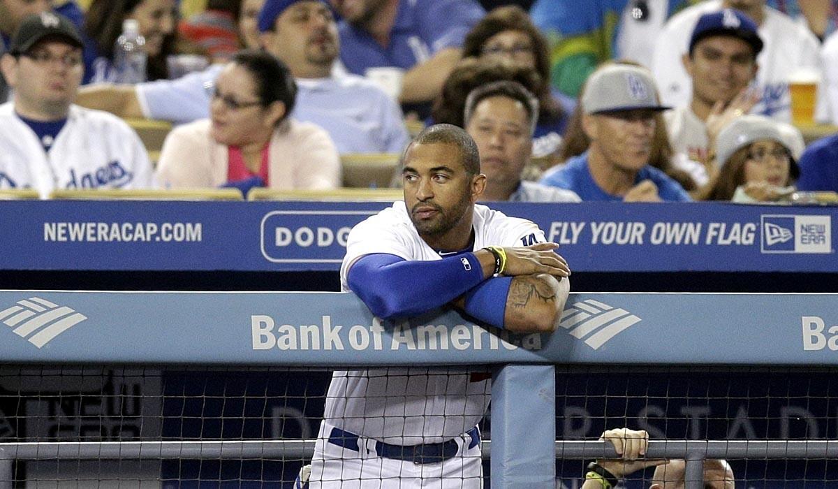 Dodgers outfielder Matt Kemp watches from the dugout during the seventh inning of a game against the Pittsburgh Pirates last week.