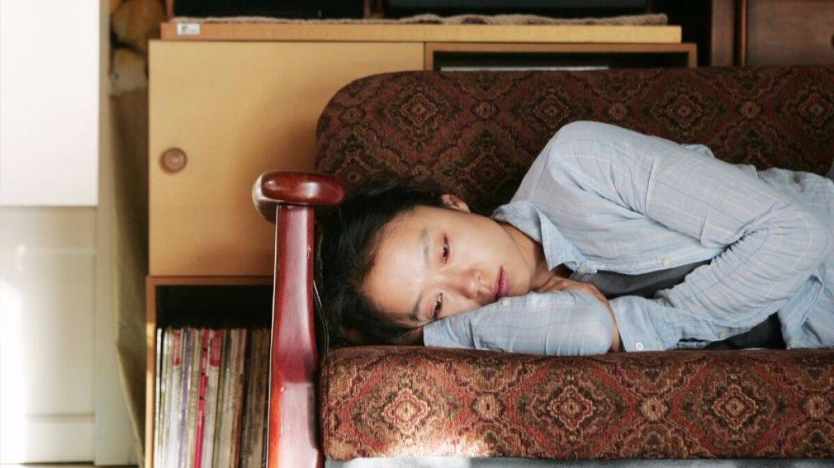 Jeon Do-yeon in "Secret Sunshine." When her husband passes away in an automobile accident, Shin-ae relocates down south to her late husband's hometown of Miryang. (IFC Films)