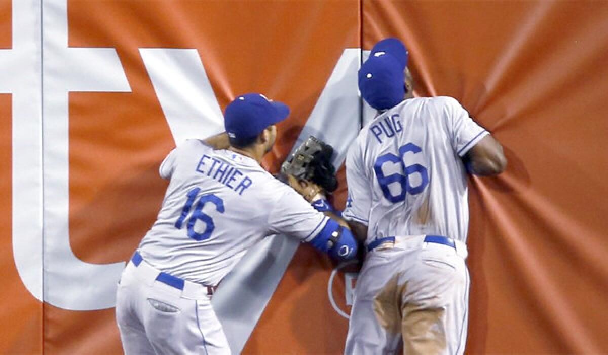 With Matt Kemp slated to return to the Dodgers' lineup next week, L.A. tentatively plans on sending rookie outfielder Yasiel Puig to left field and Andre Ethier to right.