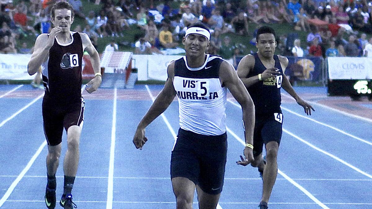 Vista Murrieta's Michael Norman wins the 400-meter dash in 45.77 seconds to repeat as state champion.