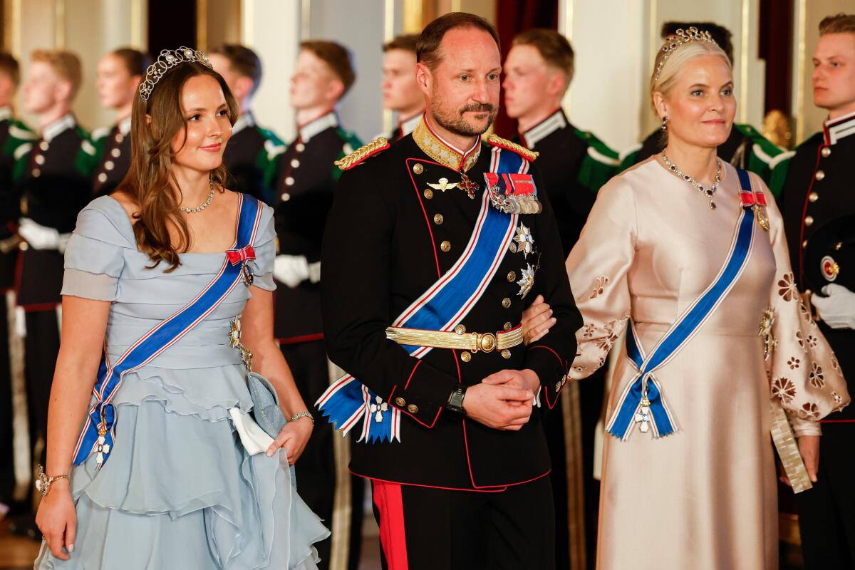 Norway's Princess Ingrid Alexandra, Crown Prince Haakon and Crown Princess Mette-Marit on their way to a gala dinner