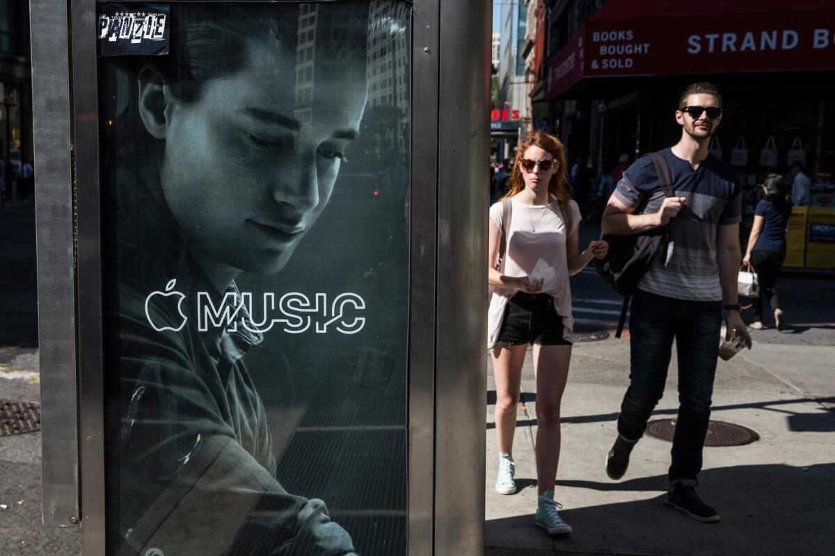 An advertisement for Apple Music on the streets of Manhattan.