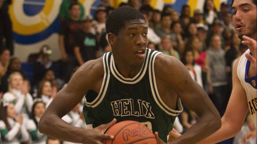 In addition to being a football standout, Kenny Keys was also an all-league basketball player for Helix.