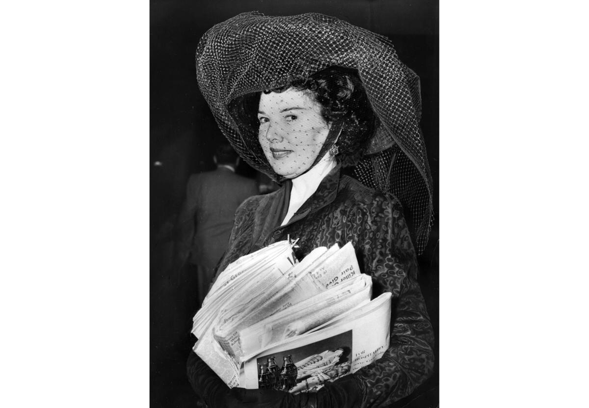 Sep. 28, 1950: Dolores Gunn, 50, wearing a big black hat to court, denies morals charge against her and says her arrest and trial is all a political frame-up.