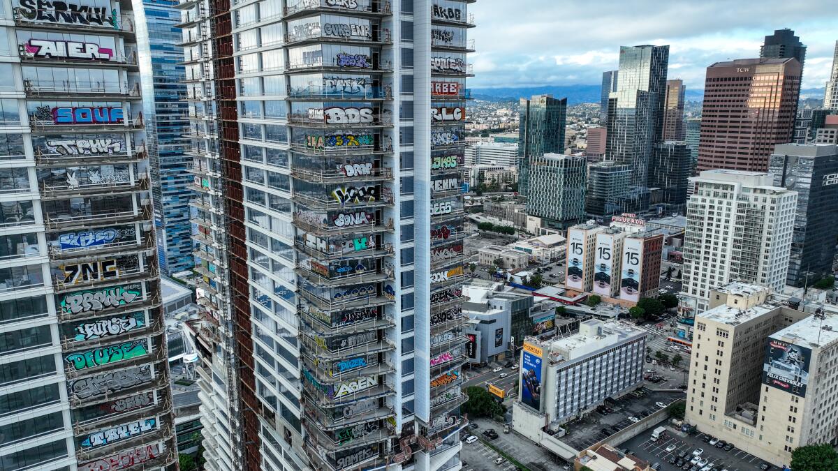Taggers have graffitied what appears to be more than 25 stories of a downtown Los Angeles skyscraper