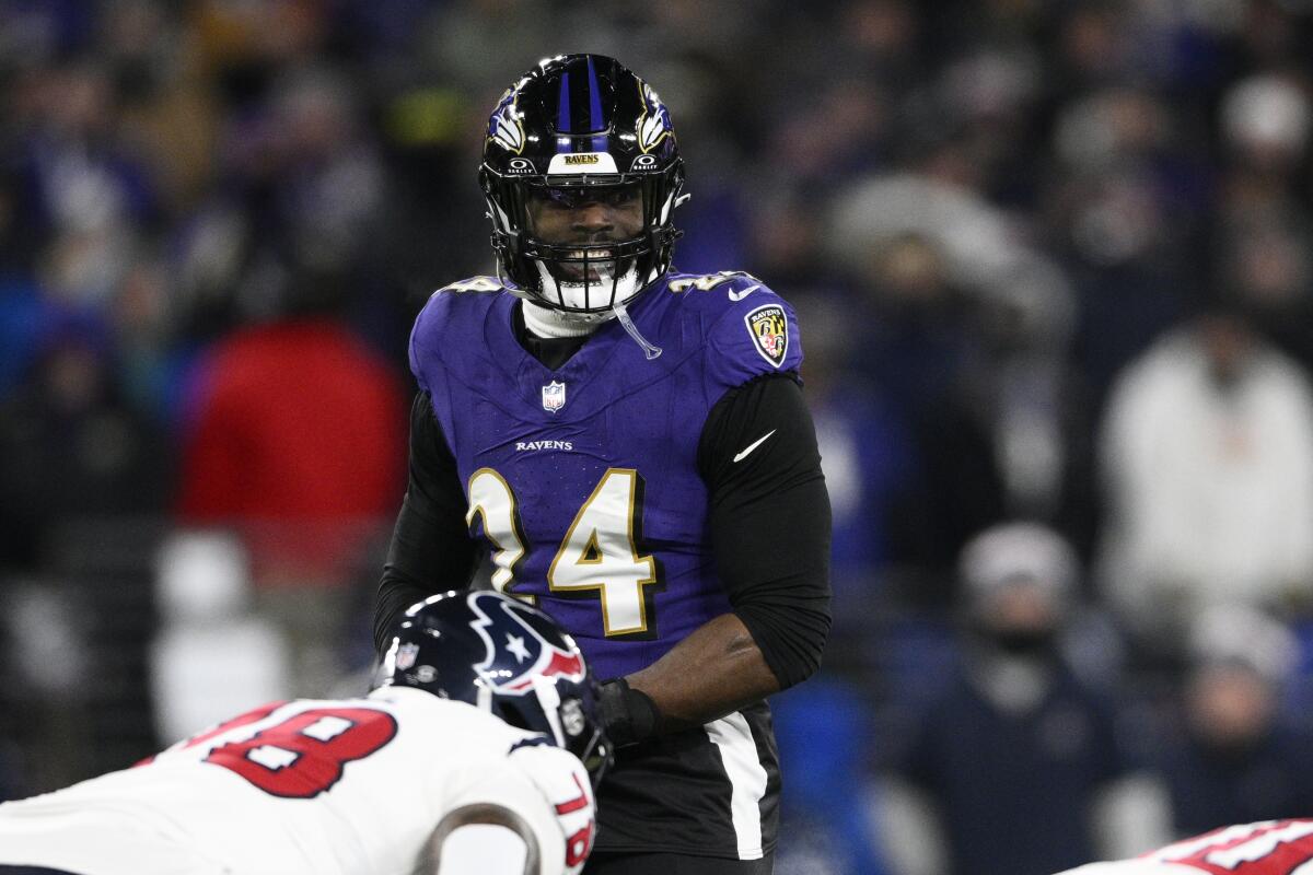 Baltimore Ravens edge rusher Jadeveon Clowney (24) lines up against the Houston Texans.