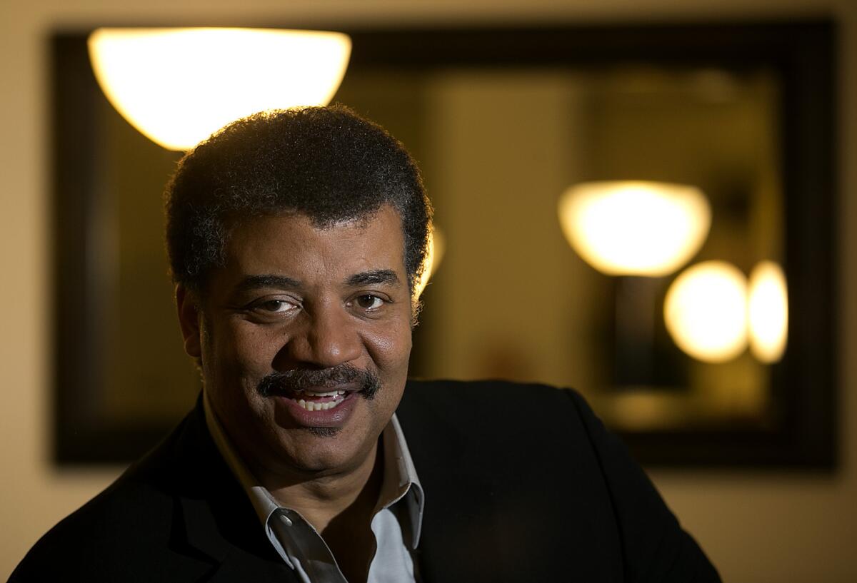 Neil deGrasse Tyson poses for a photo in Los Angeles on Dec. 14, 2013.