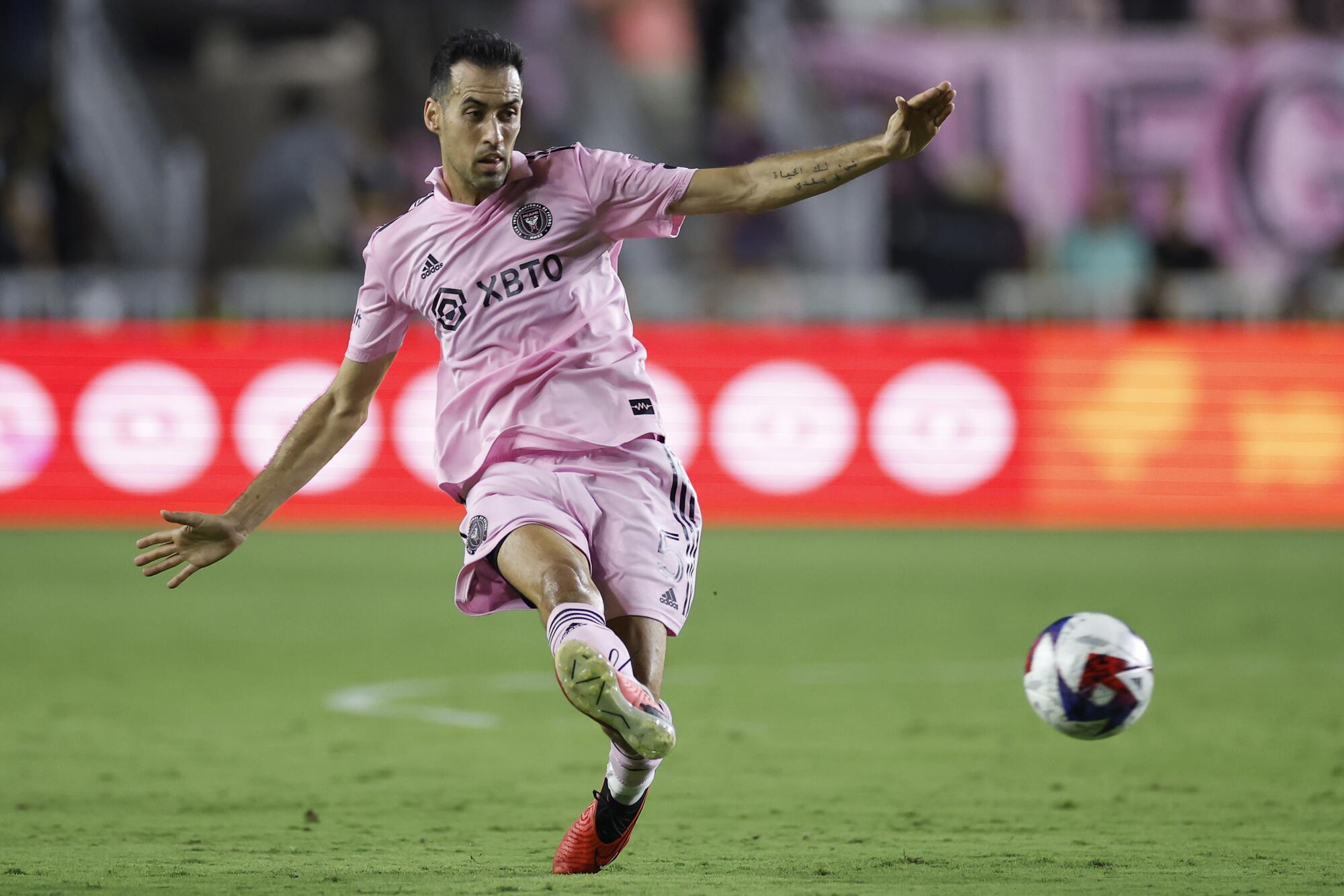 Inter Miami's Sergio Busquets delivers a pass during a game against Nashville SC on Wednesday.