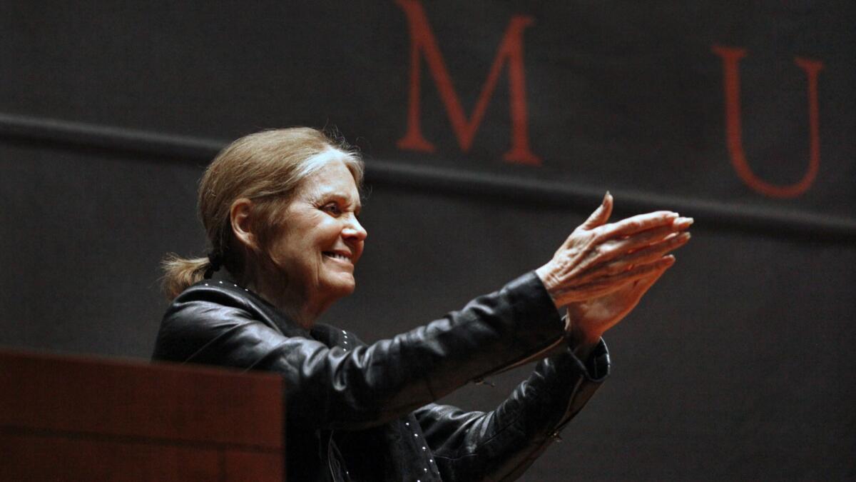 Feminist icon Gloria Steinem greets an overflow audience at the Bowers Museum in Santa Ana. The presentation featured Steinem in conversation with Ann Friedman, journalist and co-host of the podcast “Call Your Girlfriend.”