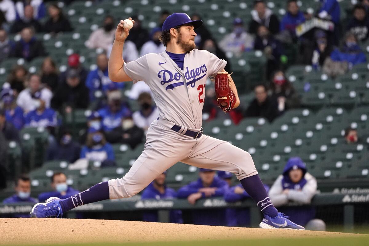 Dodgers pitcher Trevor Bauer pitches during a game.