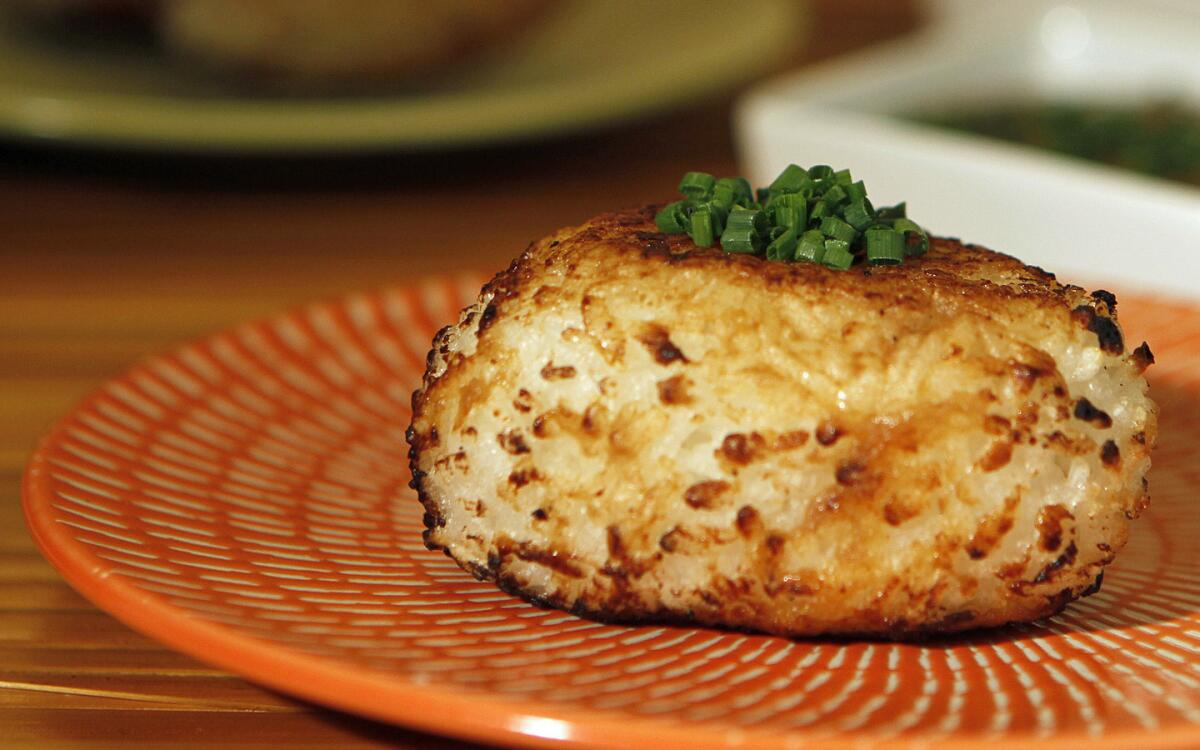 Grilled onigiri with miso sauce and chives