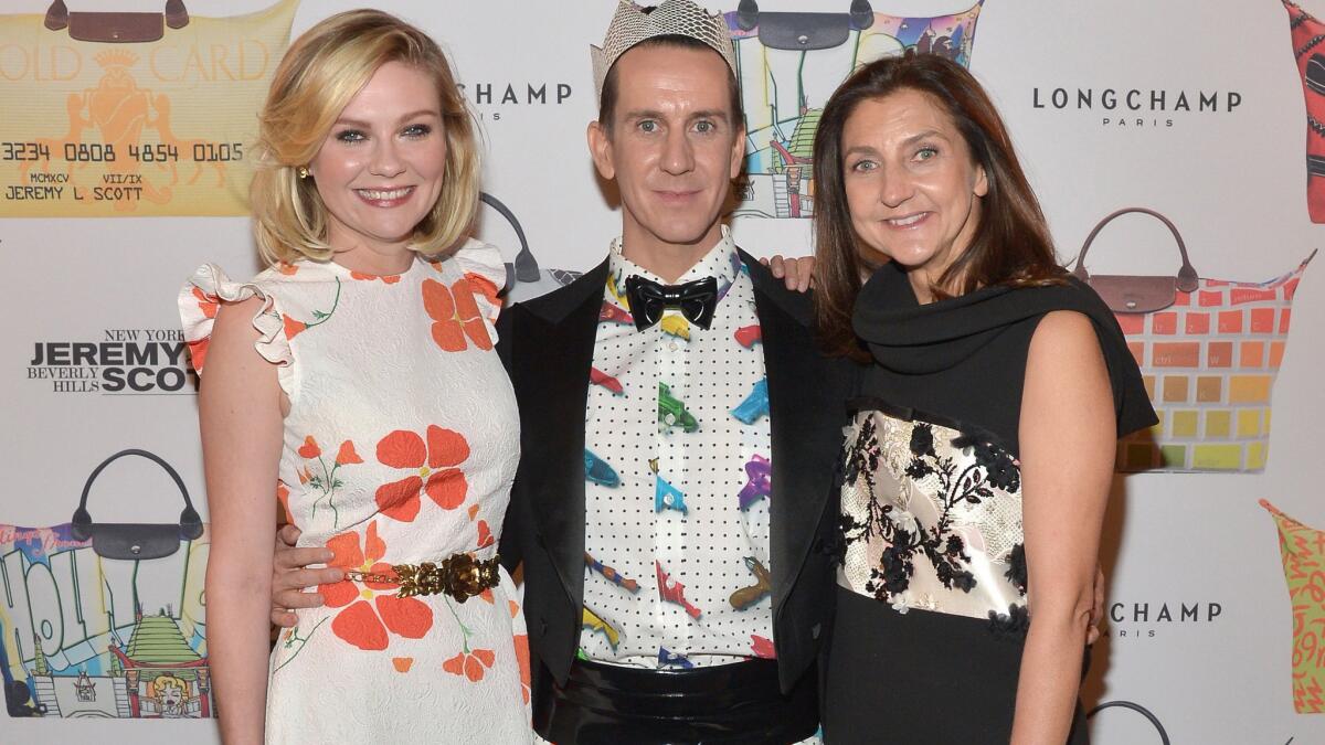 From left: Kirsten Dunst, designer Jeremy Scott and Longchamp Artistic Director Sophie Delafontaine attend the Jeremy Scott for Longchamp 10th Anniversary on Nov. 5.