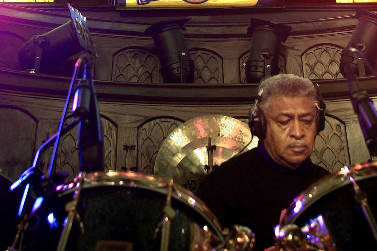 Sam Lay plays the drums.