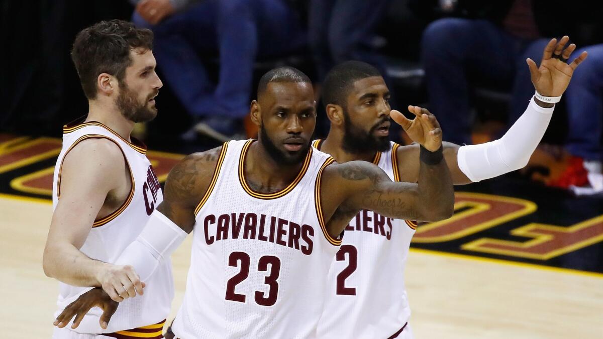 Cleveland's Kevin Love, left, LeBron James and Kyrie Irving during Game 4 of the NBA Finals on June 9.