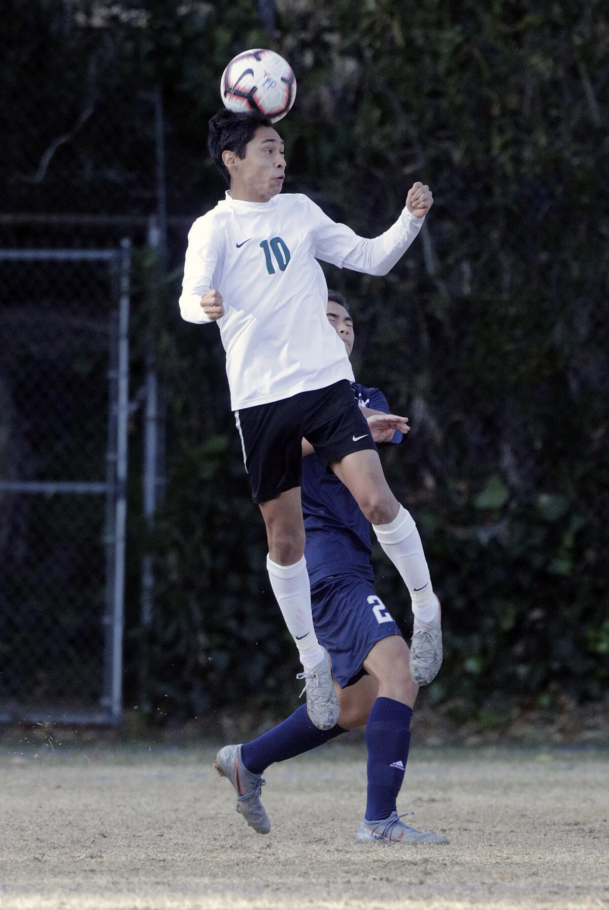 Providence's Bryan Ortiz heads the ball against Flintridge Prep in a Prep League boys' soccer game at Flintridge Preparatory School in La Canada Flintridge on Wednesday, January 29, 2020. Providence won the game 1-0 after scoring in the first half.