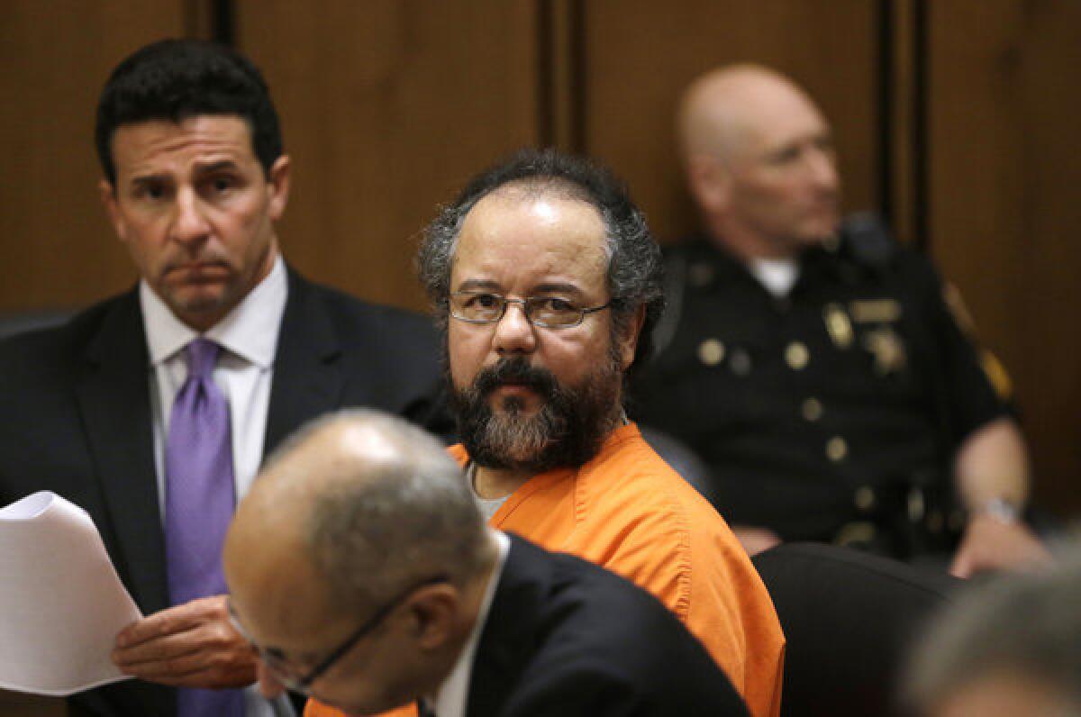 Ariel Castro sits in a Cleveland courtroom after pleading guilty to 937 counts of rape and kidnapping for holding three women captive in his home for a decade.