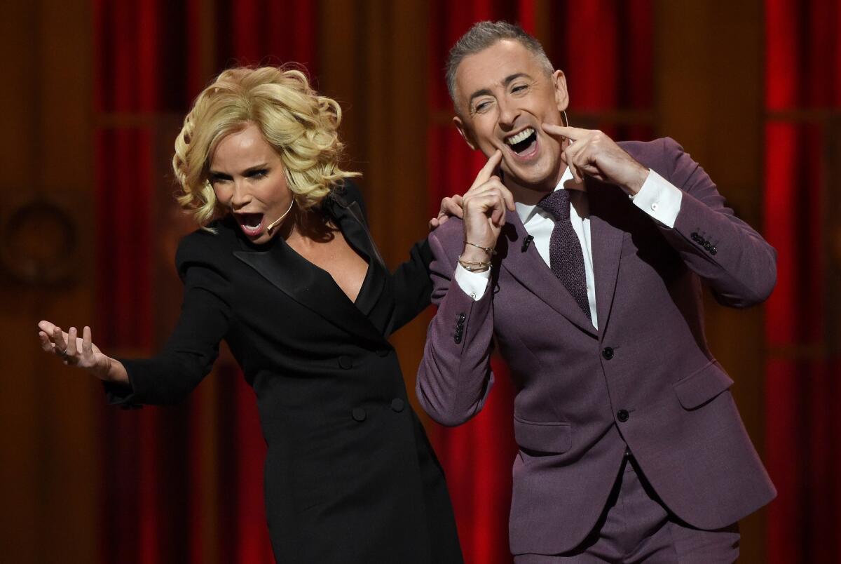 Hosts Kristin Chenoweth and Alan Cumming perform at the 2015 Tony Awards at Radio City Music Hall on June 7, 2015, in New York City.