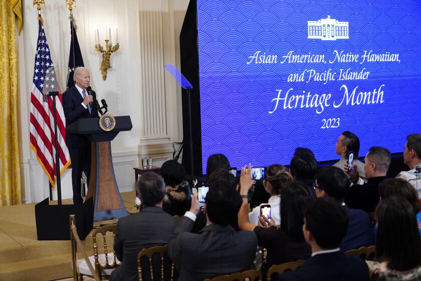 FILE - President Joe Biden speaks before a screening of the series "American Born Chinese" in the East Room of the White House in Washington, in celebration of Asian American, Native Hawaiian, and Pacific Islander Heritage Month, May 8, 2023. It has been almost 50 years since the U.S. government established that Asian Americans, Native Hawaiians and Pacific Islanders and their accomplishments should be recognized annually across the nation. (AP Photo/Susan Walsh, File)