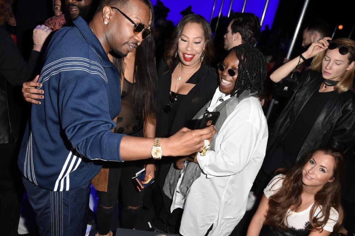 Juicy J and Whoopi Goldberg attends the Hood By Air fashion show.