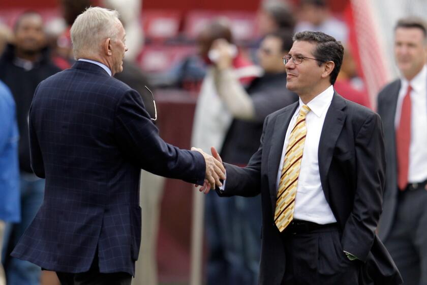 LANDOVER, MD - NOVEMBER 20: Dallas Cowboys owner Jerry Jones (L) shakes hands with Washington Redskins owner Daniel Snyder (R) before the start of Redskins and Cowboys game at FedExField on November 20, 2011 in Landover, Maryland. (Photo by Rob Carr/Getty Images)