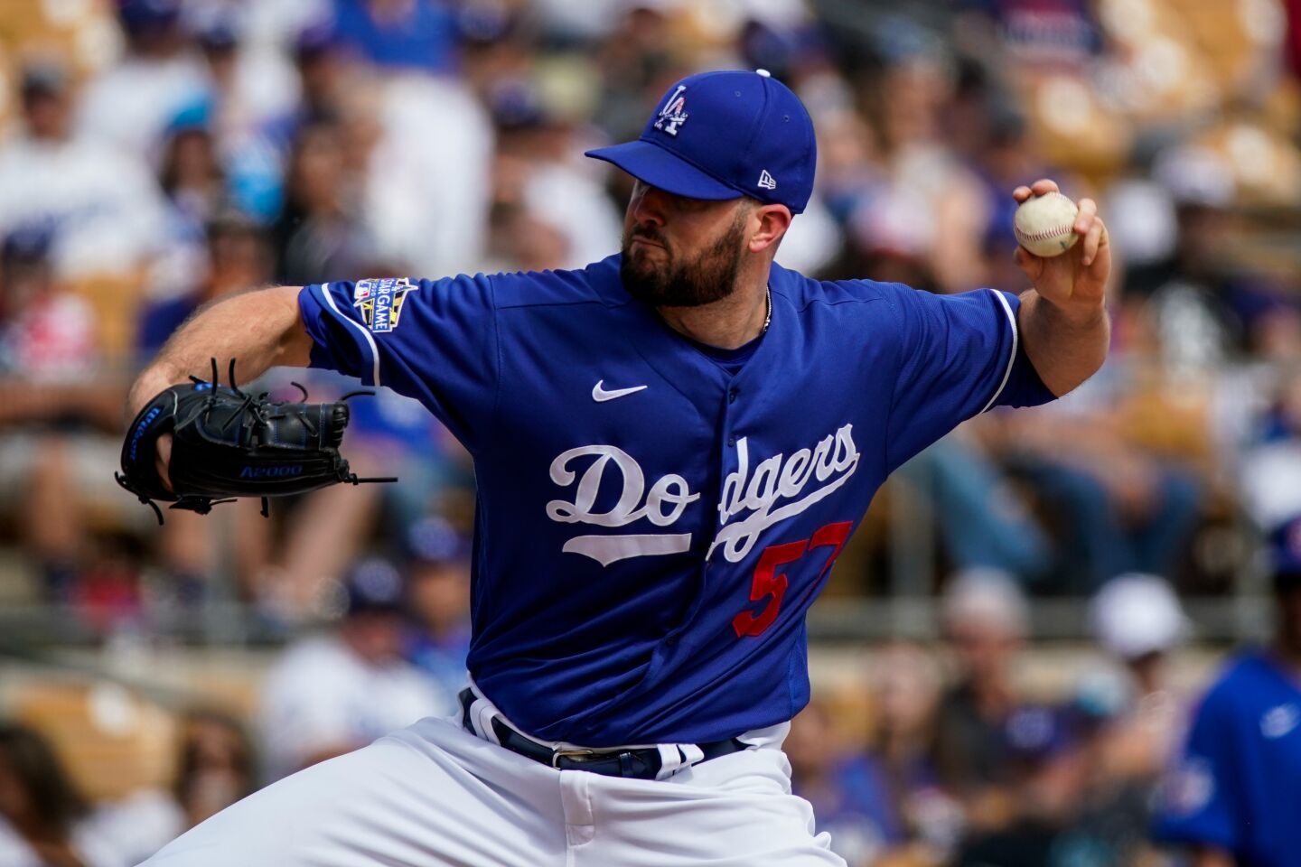 Dodgers starting pitcher Alex Wood delivers during a spring training exhibition game against the Chicago Cubs at Camelback Ranch on Feb. 23, 2020.
