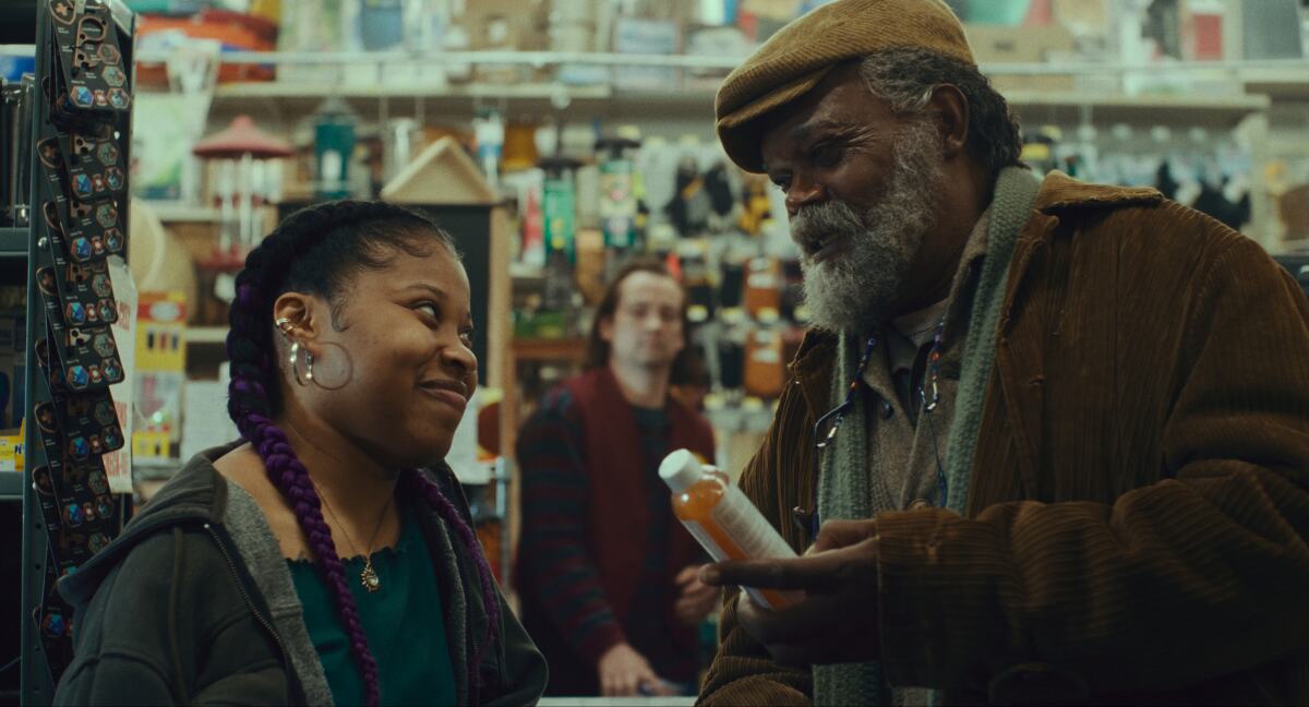 A young woman and an old man at a convenience store.