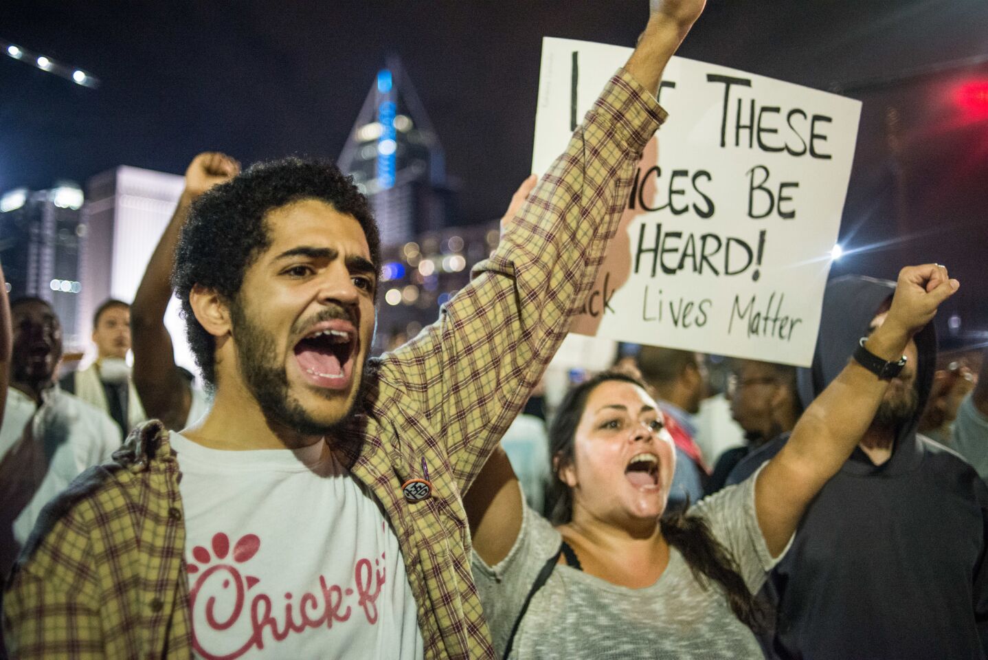 As curfew in Charlotte approached Thursday night, demonstrators voiced their views loudly.