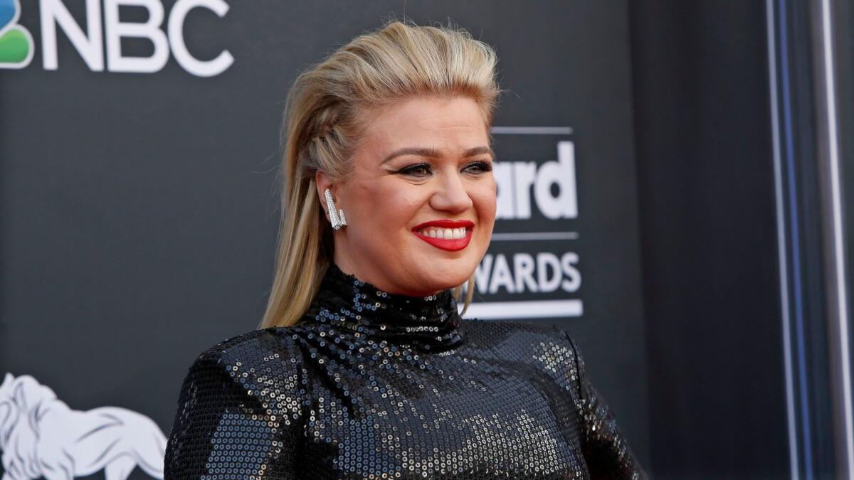 Kelly Clarkson arrives for the 2019 Billboard Music Awards at the MGM Grand Garden Arena in Las Vegas, Nevada.