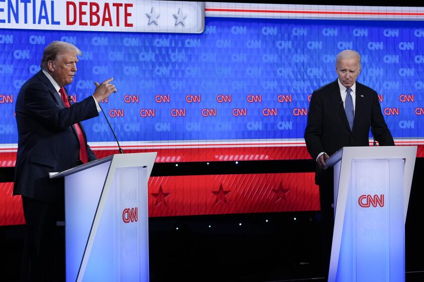 Republican presidential candidate former President Donald Trump, left, speaking during a presidential debate with President Joe Biden, right, Thursday, June 27, 2024, in Atlanta. (AP Photo/Gerald Herbert)