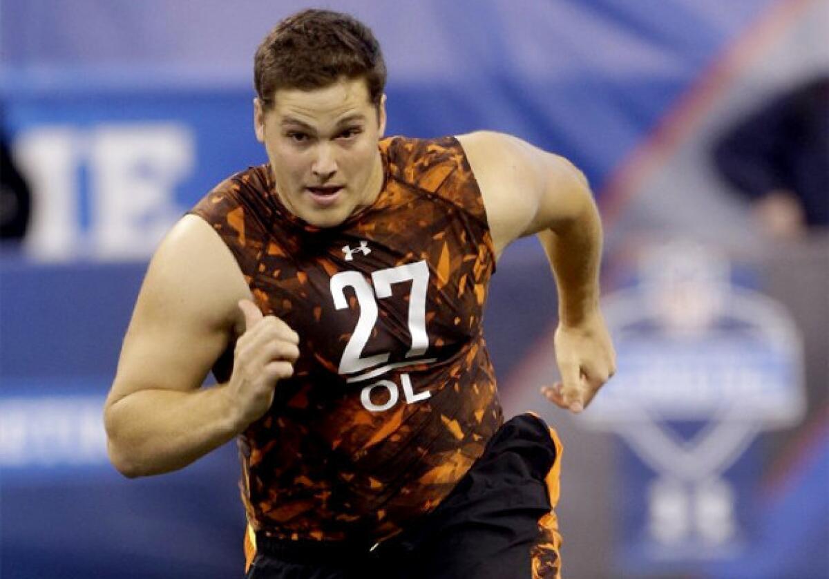 Texas A&M; offensive lineman Luke Joeckel runs a drill during the NFL scouting combine in Indianapolis.