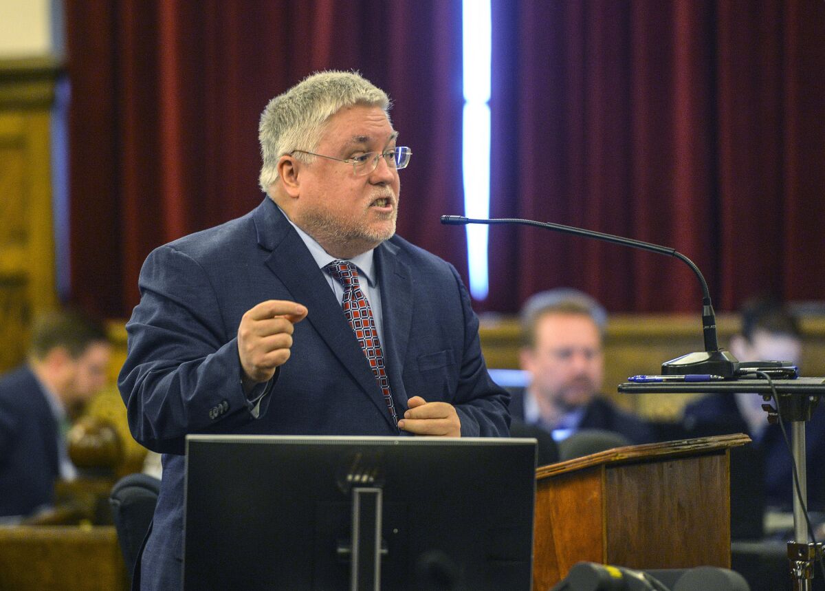 FILE - West Virginia Attorney General Patrick Morrisey presents opening arguments on April 4, 2022, on the first day of the trial against opioid drug manufacturers in Charleston, W.Va. Morrisey asked a court Tuesday, July 19, 2022, to stay a ruling that struck down a state-sponsored school voucher program which incentivized families to pull their children out of K-12 public schools. (Kenny Kemp/Charleston Gazette-Mail via AP, File)
